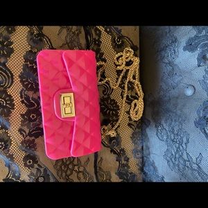 Hot pink cross body purse with gold chain